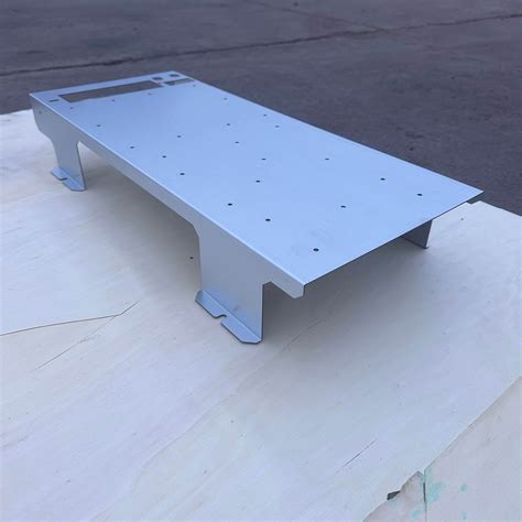 custom fabricated metal parts for seating|custom sheet metal cutting service.